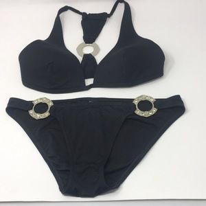 Victoria Secret , black bikini with silver accents.
